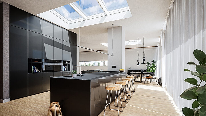 Helle, moderne Wohnküche mit Oberlicht und schwarzer Kücheninsel.